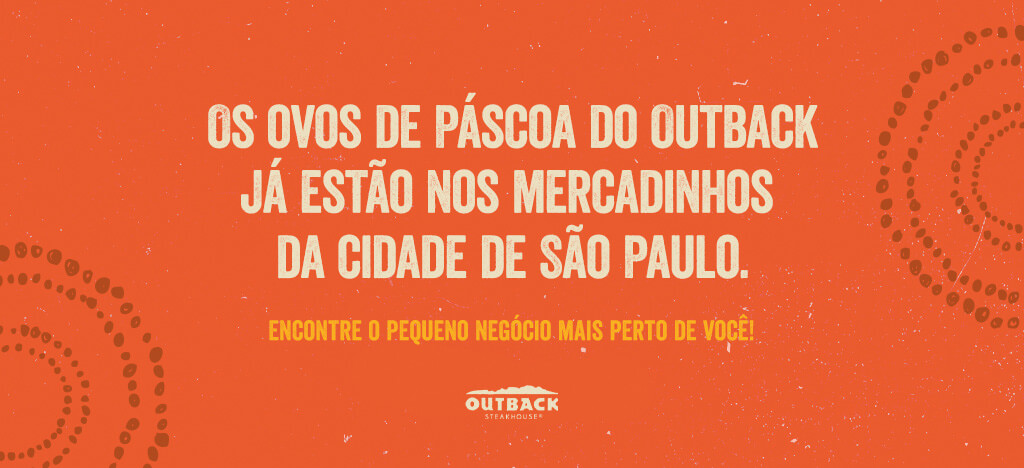 Anúncio com palavras na cor branca, ao fundo laranja anunciando ovo de pascoa.