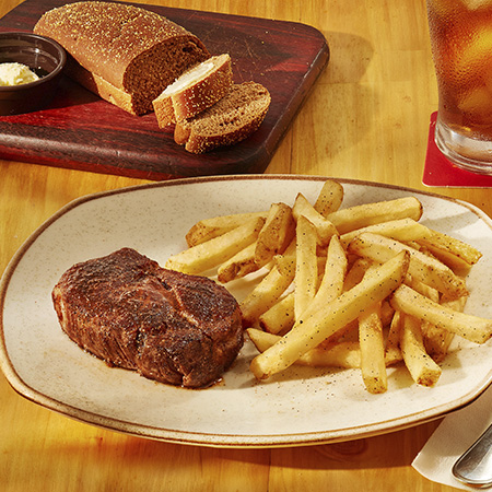 Steak servido com fritas